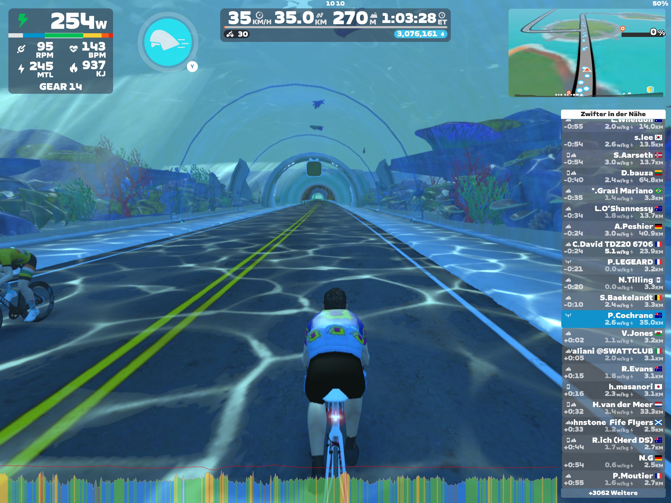 View of cyclist riding through underwater tunnel in Zwift